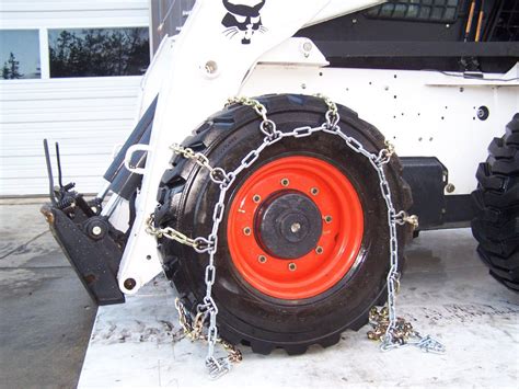 putting tire chains on a skid steer|14x17.5 skid steer tire chains.